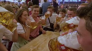 O zapft is Munichs worldfamous Oktoberfest beer festival opens [upl. by Nekial]