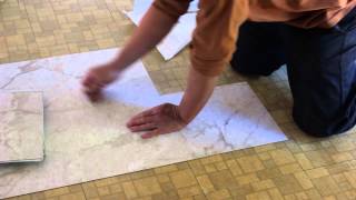 How to install sticky tiles over existing tiles [upl. by Clawson166]